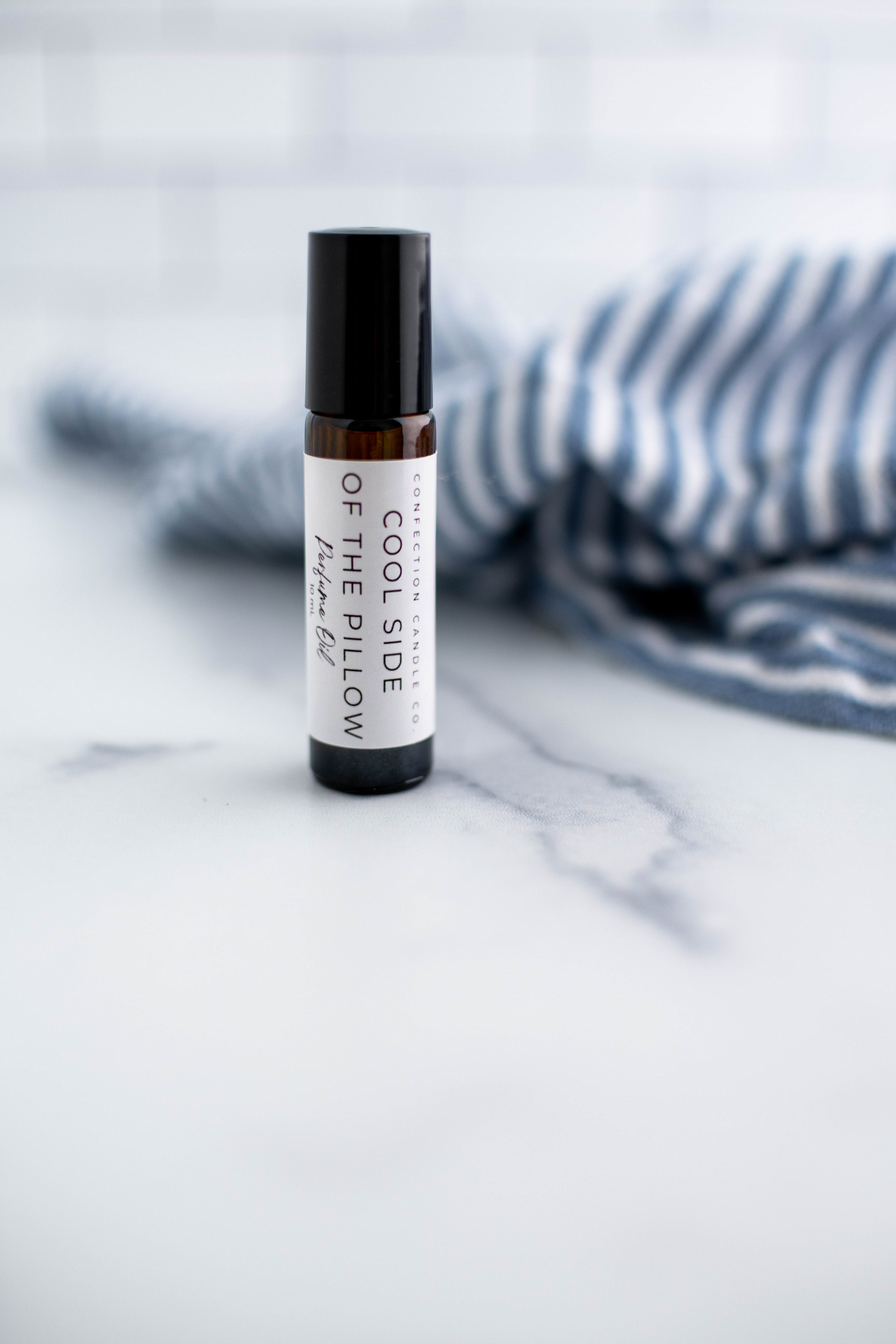 Amber glass roller bottle in the fragrance Cool Side of the Pillow.