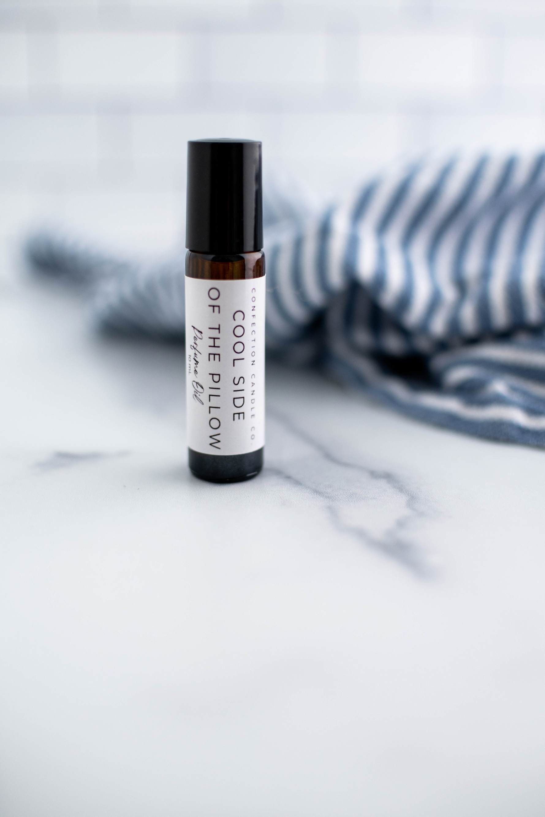 Amber glass roller bottle in the fragrance Cool Side of the Pillow.